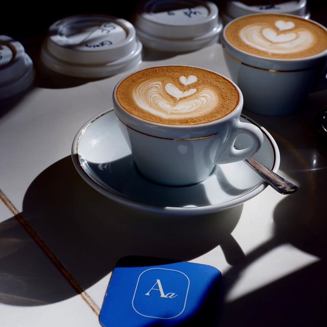Coffee with the monogram coaster
